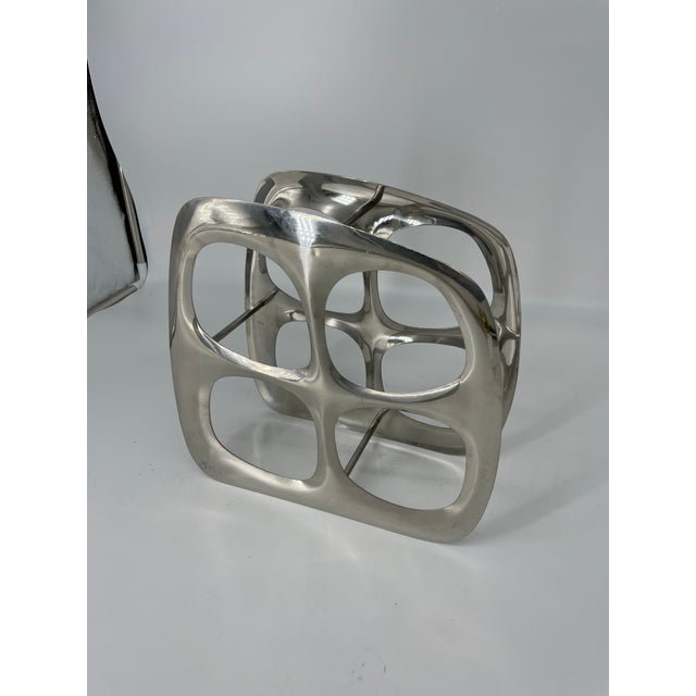 Vintage atomic, biomorphic metal wine rack.