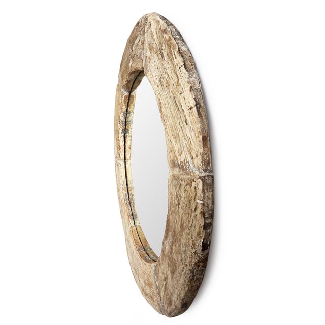 Large vintage solid and heavy round wood wheel mirror. Raw rustic old wood finish. Inside mirror area is 35" diameter....