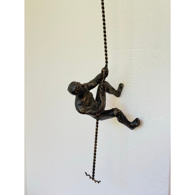 Metal Vintage Modernist Cast Metal Hanging Sculpture of a Man Climbing For Sale - Image 7 of 12