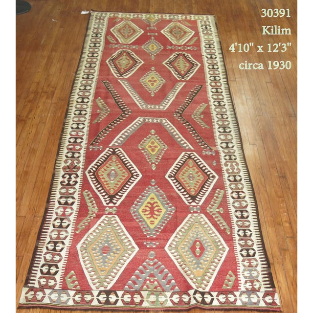 Early 20th century tribal geometric wide gallery size runner Measures: 4'10" x 12'3".