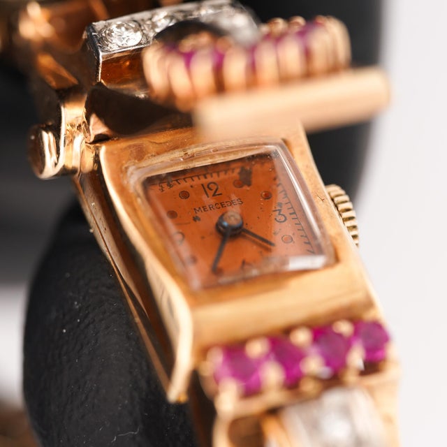Mercedes-signed vintage 14K yellow gold Art Deco hidden-dial manual wind watch bracelet featuring a gem-set dial cover...