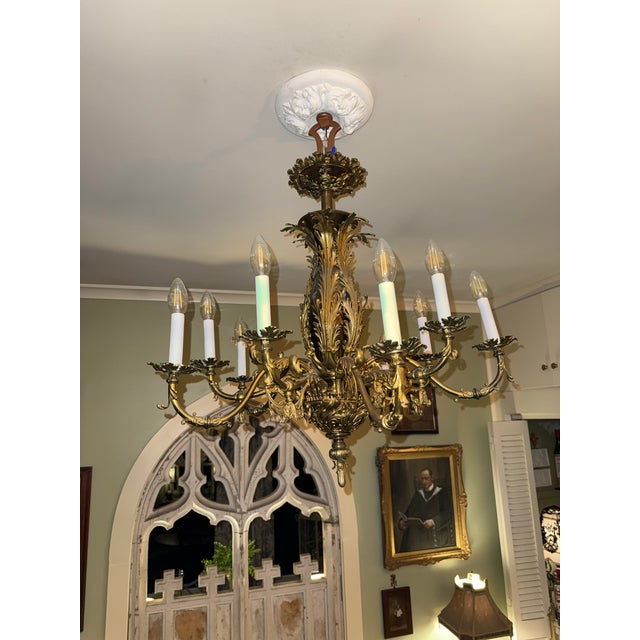 Beautiful ornate electric chandelier, formerly a gasolier, French Circa 1840. Scrolled volutes and acanthus leaves...