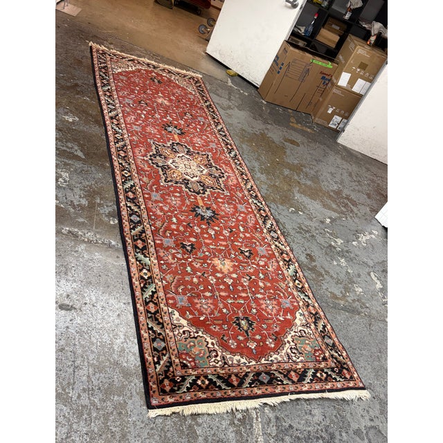 Design Plus Gallery presents a 4ft 1in × 12ft 8in Hand Knotted Heriz Style Wool Runner Rug. This handmade woolen carpet...