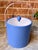 ⸻ Mid-Century Style Blue Ice Bucket with Lucite Handle A classic cylindrical ice bucket in a soft blue finish, paired with...