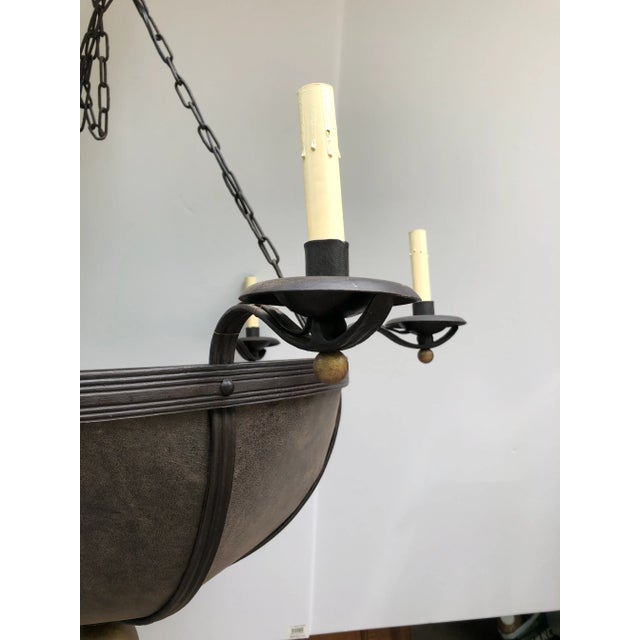 Large impressive bowl shaped chandelier made of yummy brown leather and dark brown hand forged iron. There are 6 lights...