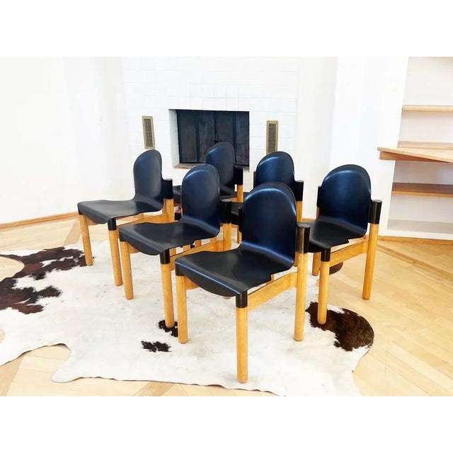 Excellent set of 6 flex 2000 stacking chairs by gerd lange for thonet, with wooden oak frames and black seats. No longer...