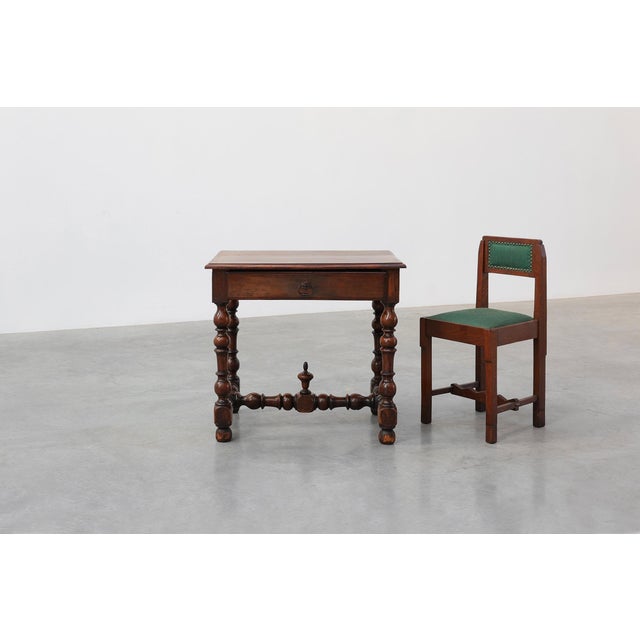 A characterful French Louis XIII side table crafted from walnut, dating to the mid-19th century. The table embodies the...