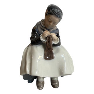 Ceramic Figurine of Girl Knitting from Royal Copenhagen, 20th Century For Sale