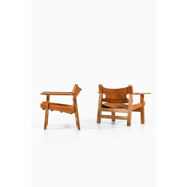 Pair of easy chairs in oak and original cognac brown leather by børge mogensen, 1950's additional information: material:...