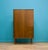 A well-proportioned mid century wardrobe by Uniflex, raised on tapered legs with brass caps. Finished in warm walnut...