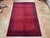Afghan Turkmen Waziri rug, hand knotted in Afghanistan from 100% wool. Measuring 6’4” x 9’9”, this rug features a vibrant...