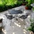 Wrought Iron Russell Woodard Restored Indoor/Outdoor Table With 4 Barrel Chairs For Sale - Image 9 of 11