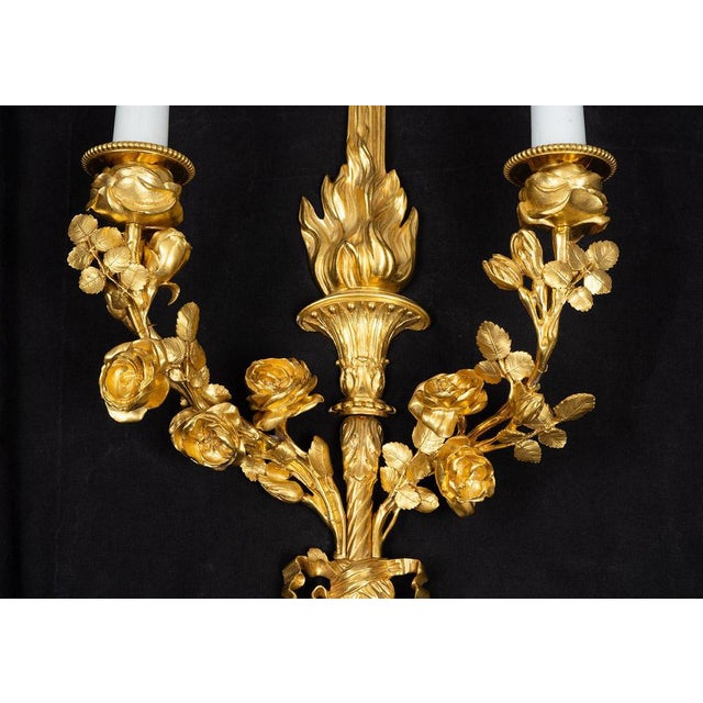 Pair of Napoleon III-style gilded bronze wall sconces dating from the second half of the 19th century. The central shaft...