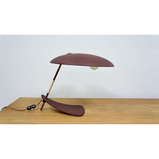 Mint Condition! New old stock, new out of box and never used. Illuminate your space with a touch of mid-century elegance...