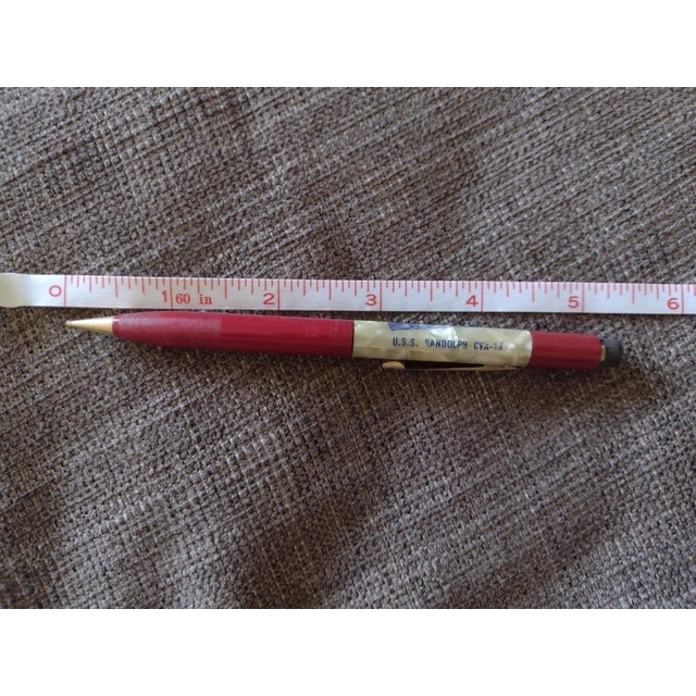 Vintage Fineline U.S.S. Randolph Mechanical Pencil. It has a rendering of the ship and the words U.S.S. Randolph CVA -15....