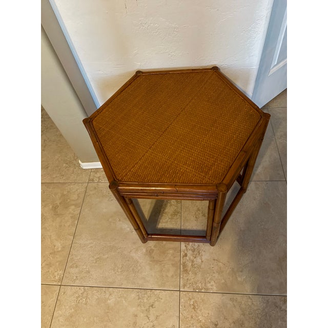 This is a Vintage Brighton Pavilion Style Burnt Bamboo Woven Rattan Top Accent Side Table. This distinct piece of mid-...