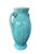 6.5” high x 4” wide (including handles) This demure vase by Shawnee Pottery USA features a lovely aqua turquoise color...