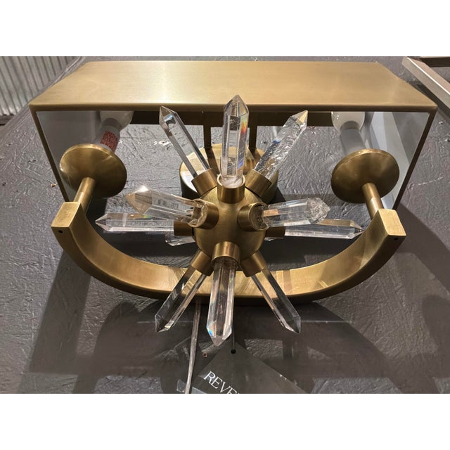 Stylish Revelation Star Quartz Sconces, Pair. Brass shade, star quartz design, 2 lights. Brass body. Showroom floor sample.