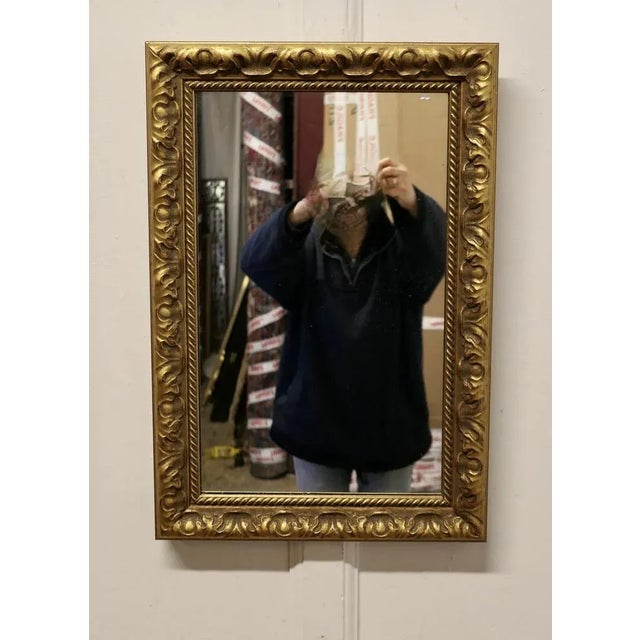 Rectangular Gilt Wall Mirror The mirror is in a 2” wide decorated Gilt Frame, this can be hung Both Landscape and Portrait...