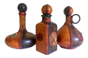 Vintage Mid Century Italian Hand Tooled Leather Wrapped Decanter Bottles - Set of 3