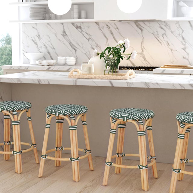 Evoking images of sidewalk tables in the Cote d' Azur; counter stools like this will give your kitchen or patio the casual...