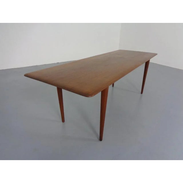Coffee table von Peter Hvidt & Orla Mølgaard Nielsen in Teak. Some scratches at the corner of the top (see photos) This...