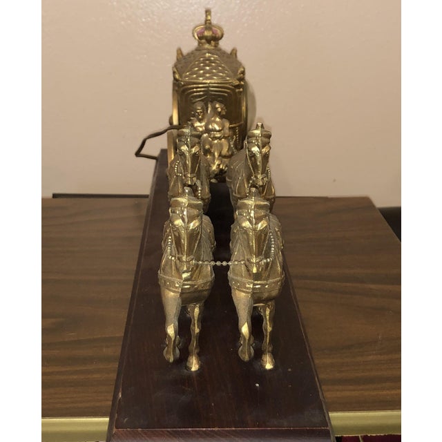 A striking piece of mid-century Americana, this Model 640 electric mantel clock was crafted in Brooklyn, New York, by the...