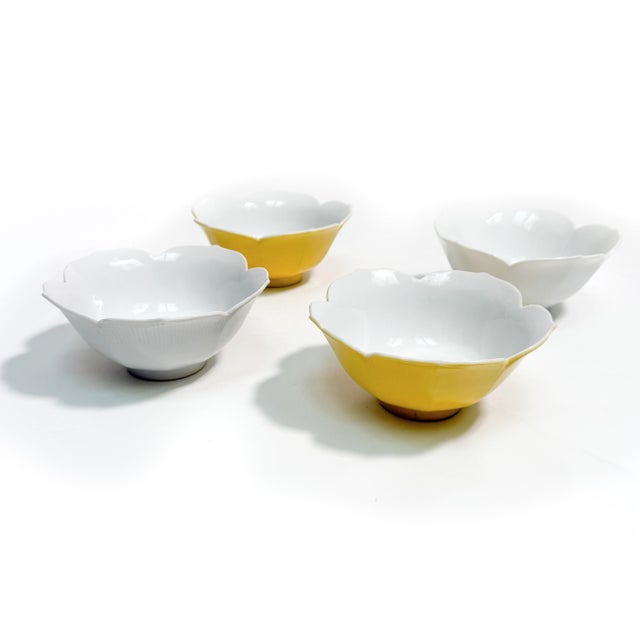 Vintage MCM 4 piece set of whimsical yellow and white lotus flower shaped ceramic bowls, made in Japan. The set includes...