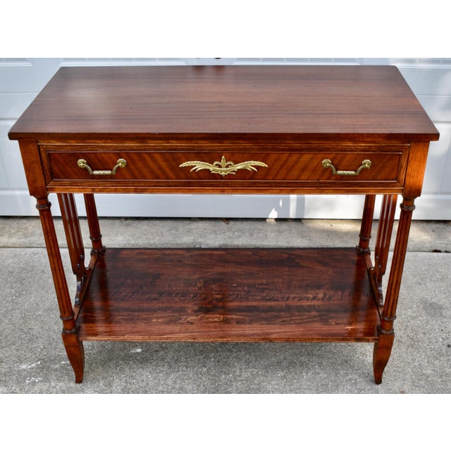Vintage (1960's) Console Table, Entry Table, Hall Table made by Northern Furniture Co. The Table has a Regency Style. The...