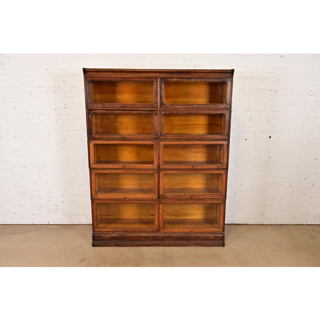 A rare antique Arts & Crafts double five-stack barrister bookcase In the manner of Globe Wernicke USA, Circa 1900 Gorgeous...