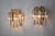 Very beautiful and rare pair of venini sconces produced in italy in the 70s. Murano cut glass distributed on two levels of...
