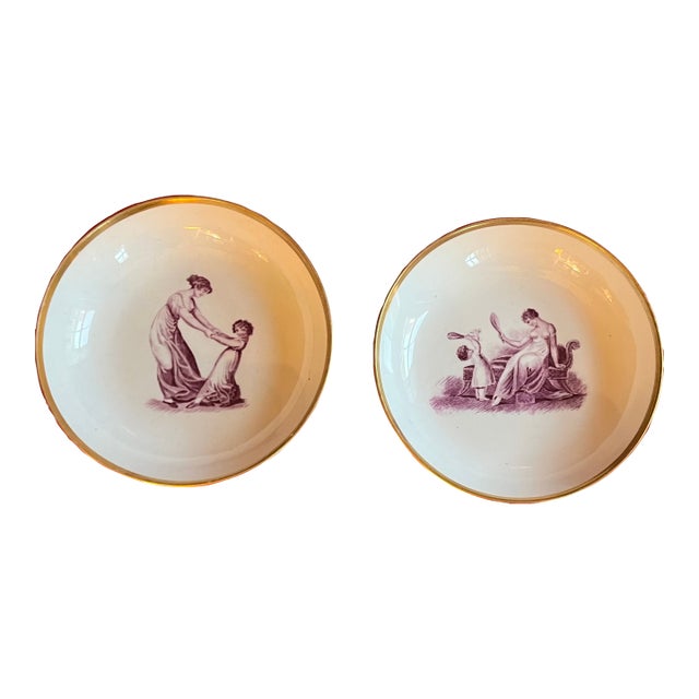 Antique 19th Century English Regency Porcelain Saucer Dishes With Adam Buck Domestic Scene in Puce Purple Circa 1810 - A Pair For Sale