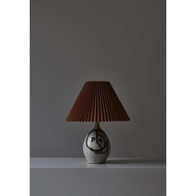 Beautiful unique Scandinavian Modern table lamp handmade by "AP" ceramics at the island of Bornholm, Denmark in the 1970s....
