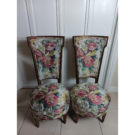 This product is a set of two Victorian style parlor chairs with a beautiful floral design and cushion set included. The...