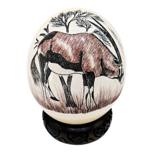 Mid-Century South African Scrimshaw Ostrich Egg With Engraved Oryx on Carved Wood Stand