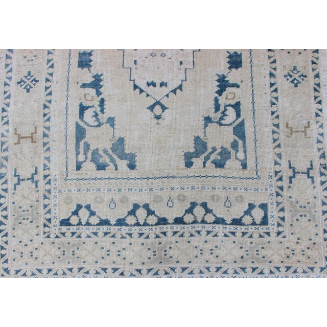 Textile Vintage Hand Knotted Turkish Oushak Rug With Central Medallion in Blue and Cream For Sale - Image 7 of 12