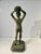 Art Deco period figure of a young athletic male arched throwing a soccer ball. This expressive, handsome piece is signed...