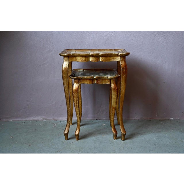 Italian elegance in all its splendor! Here is a charming pair of nesting tables in the Florentine Baroque style, made in...
