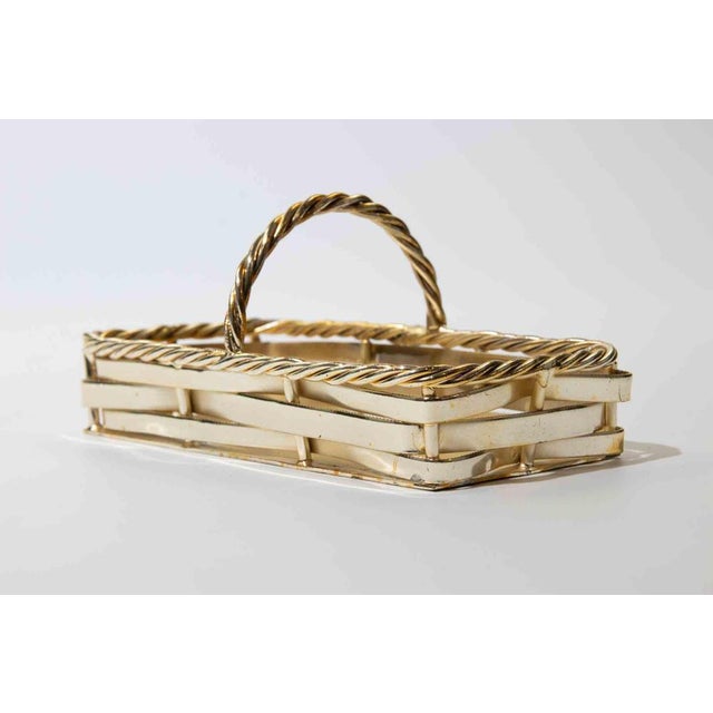 Decorative rectangular serving basket in silverplate with warm gilt-toned finish, produced by Bologna Silverplate, Italy....