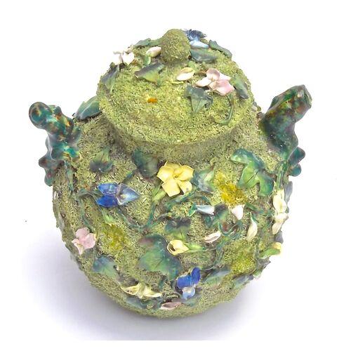 Antique porcelain mossware floral majolica lidded jar. Porcelain flowers in three-dimensional relief on a detailed...