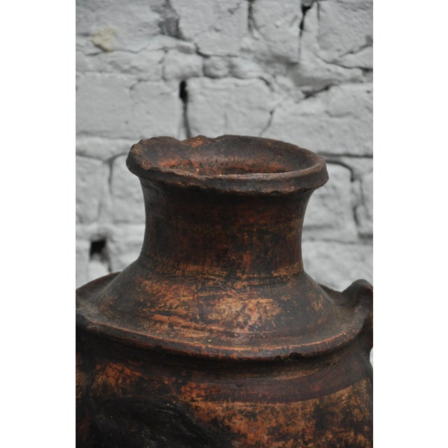 Late 19th Century Primitive Spanish Clay Pot. Found in Spain. This Substantial and beautiful pot has two handles and a...