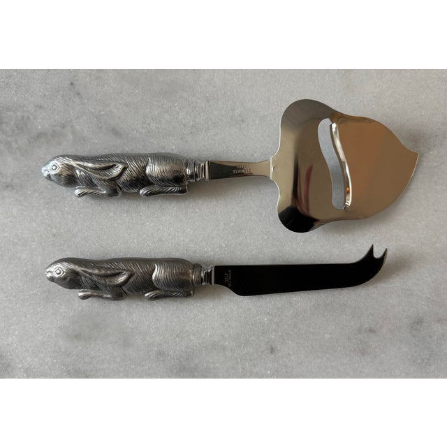 Vintage cheese serving knife set with bunny or rabbit handles made by Arthur Court. Includes cheese slicer and a cheese...