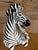 A striking large-scale vintage ceramic zebra figurine by Tilso Japan, beautifully executed with bold hand-painted black...
