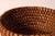 This antique woven basket embodies traditional craftsmanship and the timeless charm of vintage utilitarian objects. Its...