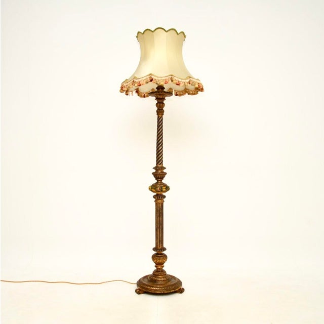 An absolutely stunning antique Victorian gilt wood floor lamp. This was made in England, it dates from around the...
