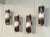 Four 1960s wall lamps by Ludovico Diaz De Santillana for Venini, with brass frames and glass diffusers. This piece is...