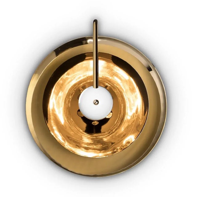 Basie wall light fixture is a modern representation of the sci-fi aesthetics of the 1960s. The vintage mid-century lamp...