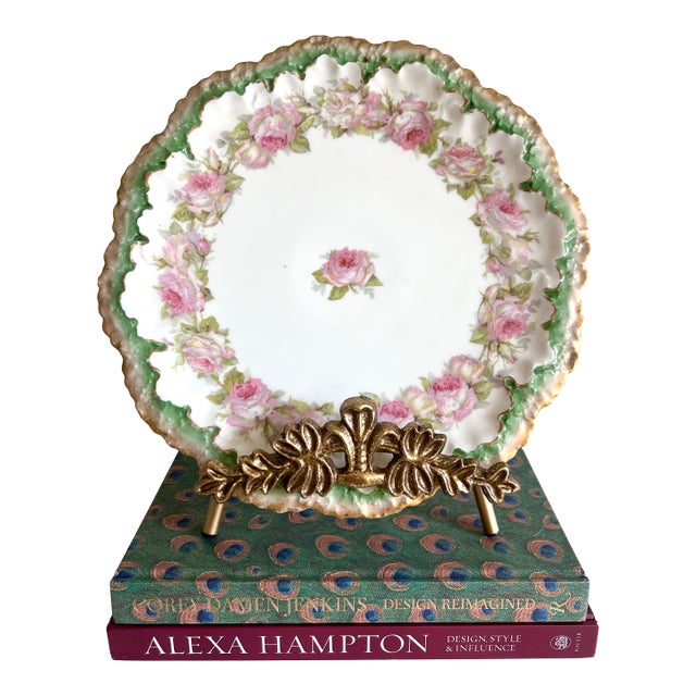 An exquisite Limoges porcelain plate by A. Lanternier, crafted in France in the late 19th century. This piece features a...
