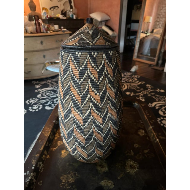 Tall African Zulu Ukhamba Beer Basket – Handwoven Tribal Decor The Zulus are the largest tribe in Southern Africa,...