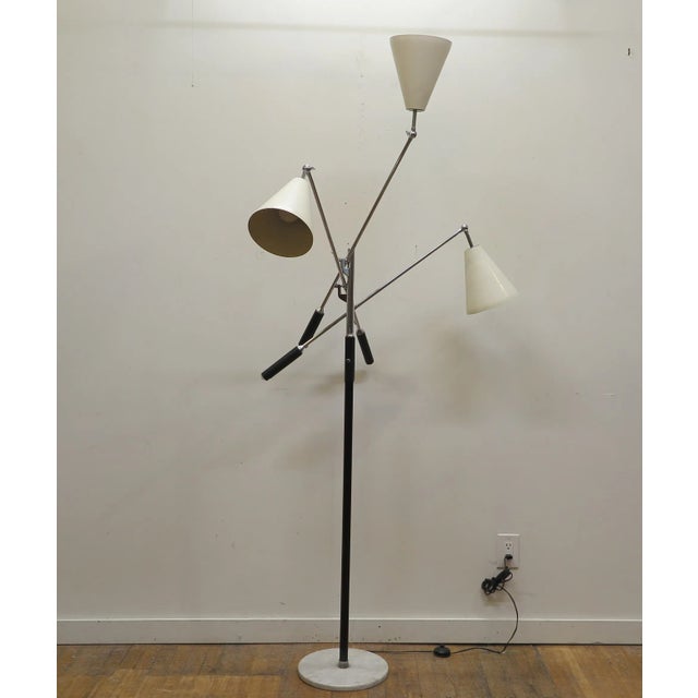 Iconic Mid Century Italian Triennale Floor Lamp. Original design 1947 by Angelo Lelii for Arredoluce Monza, Italy. This...